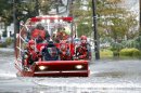 Rescue workers use a hovercraft to rescue a resident from flood waters brought on by Hurricane Sandy in Little Ferry