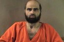 FILE - This undated file photo provided by the Bell County Sheriff's Department shows Nidal Hasan, the Army psychiatrist charged in the 2009 Fort Hood shooting rampage that left 13 dead. Tight security measures are in place at the Texas Army post and neighboring city of Killeen in preparation for the start of jury selection Tuesday, July 9, 2013, Hasan's capital murder trial. (AP Photo/Bell County Sheriff's Department, File)