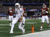 Texas A&M's Johnny Manziel (2) reaches the end zone for a touchdown as Oklahoma's Frank Shannon (20) and others give chase in the first half of the Cotton Bowl NCAA college football game Friday, Jan. 4, 2013, in Arlington, Texas. (AP Photo/LM Otero)