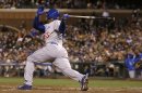 Los Angeles Dodgers' Yasiel Puig follows through on a solo home run off San Francisco Giants pitcher Matt Cain during the fifth inning of a baseball game in San Francisco, Tuesday, Sept. 24, 2013. (AP Photo/Jeff Chiu)