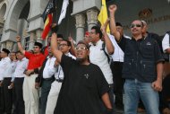 Members of Perkasa hold a rally outside the Court of Appeal in Putrajaya on October 14, 2013 before the court ruling on the ‘Allah’ appeal. — Picture by Saw Siow Feng