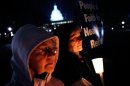 The Leadership Conference of Women Religious participate in a candlelight vigil for health care reform