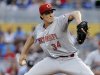 Cincinnati Reds pitcher Homer Bailey throws in the first inning during a baseball game against the Miami Marlins in Miami, Tuesday, May 14, 2013. (AP Photo/Lynne Sladky)