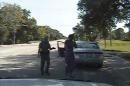 In this July 10, 2015, frame from dashcam video provided by the Texas Department of Public Safety, trooper Brian Encinia arrests Sandra Bland after she became combative during a routine traffic stop in Waller County, Texas. Bland was taken to the Waller County Jail that day and was found dead in her cell on July 13. (Texas Department of Public Safety via AP)