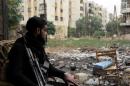 A rebel fighter is pictured on November 7, 2013, in the northern Syrian city of Aleppo