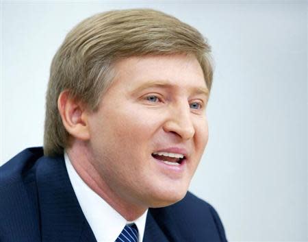 An eastern Ukrainian steel and coal magnate Akhmetov who is considered Yanukovych's main financial backer answers journalist's question during...