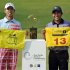 Winner Guan holds a certificate of invitation to the 2013 Masters Tournament as runner-up Pan poses with a certificate of entry to International Final Qualifying for the Open Championship, during the Asia-Pacific Amateur Championship in Chonburi