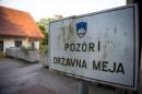 A sign reading "Attention! National Border" pictured on the Slovenian-Croatian border in Obrezje, Slovenia on June 18, 2013