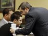 Trent Mays, 17, left, talks with one of his defense lawyers, Brian Duncan before the start for the fourth day of his and co-defendant 16-year-old Ma'lik Richmond's trial on rape charges in juvenile court on Saturday, March 16, 2013 in Steubenville, Ohio. Mays and Richmond are accused of raping a 16-year-old West Virginia girl in August, 2012. (AP Photo/Keith Srakocic, Pool)