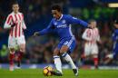 Chelsea's midfielder Willian controls the ball during the English Premier League football match between Chelsea and Stoke City at Stamford Bridge in London on December 31, 2016
