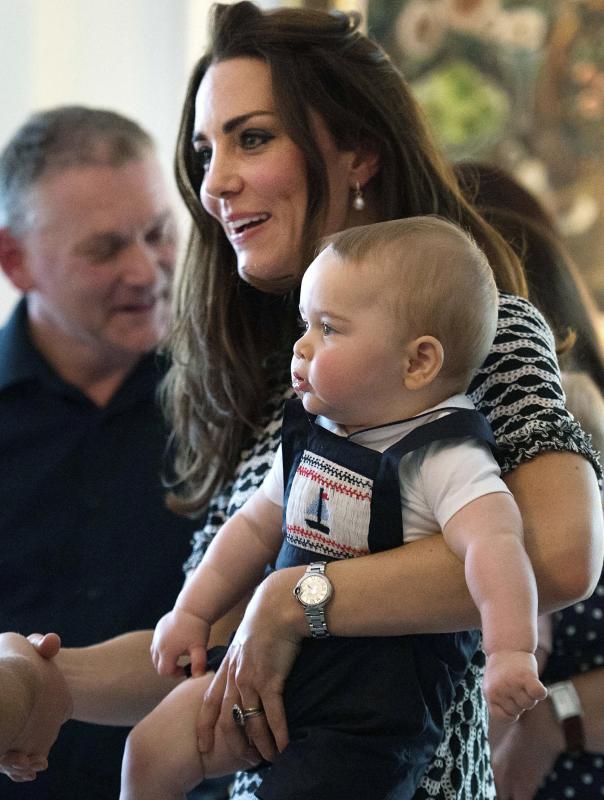 Britain&#39;s Kate, the Duchess of Cambridge, holds Prince George during a visit to Plunket nurse and parents group at Government House in Wellington, New Zealand, Wednesday, April 9, 2014. Plunket is a national not-for-profit organization that provides care for children and families in New Zealand. Prince William, his wife Kate and their son, Prince George, are on a three-week tour of New Zealand and Australia. (AP Photo/Marty Melville, Pool)
