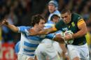 South Africa's wing Bryan Habana (R) is tackled by Argentina's fly half and captain Nicolas Sanchez during the bronze medal match of the 2015 Rugby World Cup at the Olympic Stadium, east London, on October 30, 2015