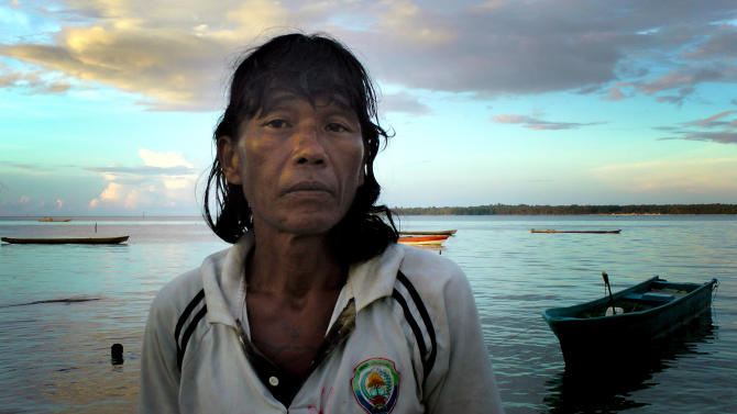 This Friday, Nov. 28, 2014 image shows Ngwe Thein, 42, who has been living on an island near Benjina, Indonesia for three years, after being forced to work on a fishing trawler with inadequate food and little or no pay, he said. In the wake of an AP report on  fishermen who were enslaved, on Thursday, March 26, 2015, Thai lawmakers voted unanimously to create tougher penalties for violating the country&#39;s anti-human trafficking law, including the death penalty. But in a Thursday email, Phil Robertson, deputy director of Human Rights Watch&#39;s Asia division said, &quot;The Thailand government has made repeated verbal commitments to get tough with traffickers but every time real follow-up has been lacking.&quot; In the meantime, Thein is one of the thousands of men who are waiting. (AP Photo/APTN, Esther Htusan)
