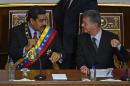 Venezuela's opposition leader Henry Ramos Allup (R), seen here at the president's annual report on January 15, 2016, revived calls to oust President Nicolas Maduro (L) from office this year