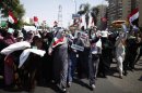 Supporters of deposed Egyptian President Mursi march from Raba El-Adwyia square to the Republican Guards headquarters in Cairo