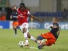 Montpellier's Bocaly challenges Arsenal's Gervinho during their Champions League soccer match at the Stade de la Mosson stadium in Montpellier