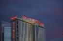The Trump Taj Mahal Casino is illuminated at dusk in Atlantic City, New Jersey