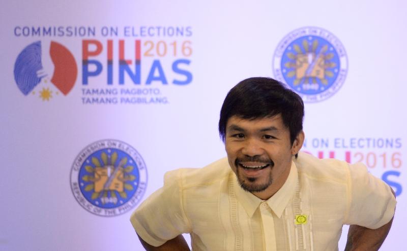 Manny Pacquiao a newly elected senator in the Philippines, told AFP his top priority was his political career but his love for boxing had not diminished (AFP Photo/Noel Celis)