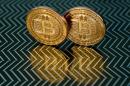 New York's powerful banking regulator Benjamin Lawsky said Wednesday that digital currencies like Bitcoin pose a major challenge, but should not be stifled
