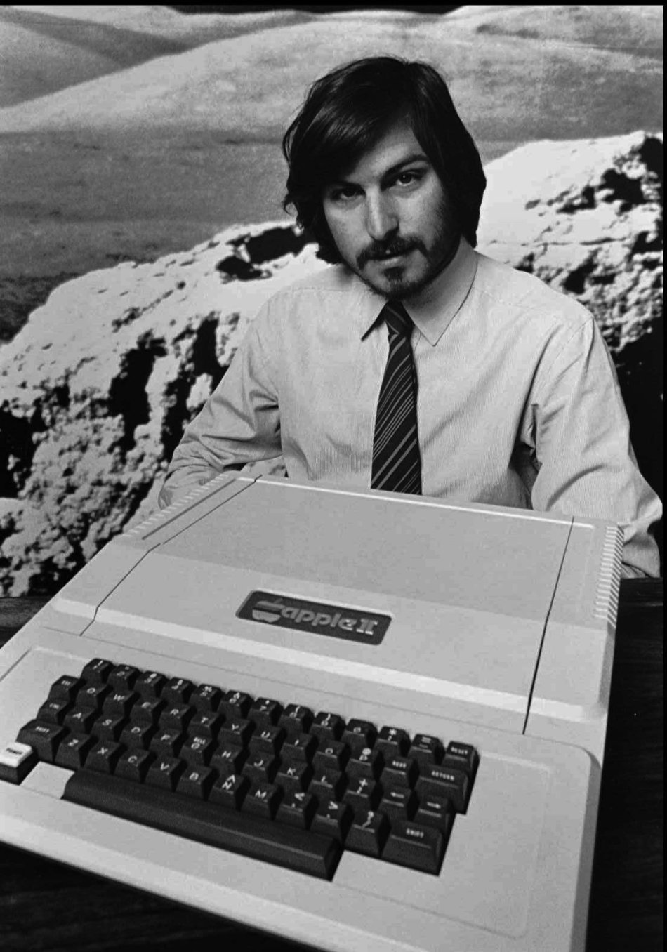 1977 - Photo shows Apple co-founder Steve Jobs as he introduces the new Apple II in Cupertino, Calif. Apple on Wednesday, Oct. 5, 2011 said Jobs has died. He was 56. (AP Photo/Apple Computers Inc., Fi