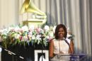 First Lady Michelle Obama delivers remarks at the Grammy Museum's Jane Ortner Education Award Luncheon in Los Angeles Wednesday, July, 16, 2014. Obama says every arts organization in the country should embrace the mission of the Grammy Museum in Los Angeles, which focuses on education. (AP Photo/Damian Dovarganes)