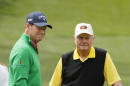 Tom Watson, left, talks to Jack Nicklaus on the second hole during the par three competition at the Masters golf tournament Wednesday, April 6, 2016, in Augusta, Ga. (AP Photo/Chris Carlson)