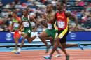 South Africa's Simon Magakwe (2nd R) competes in the heats of the men's 100m athletics event at Hampden Park during the 2014 Commonwealth Games in Glasgow, Scotland, on July 27, 2014