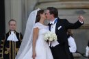 Sweden's Princess Madeleine and Christopher O'Neill kiss outside the Royal Chapel after their wedding ceremony in Stockholm, Saturday June 8, 2013. (AP Photo/Bjorn Larsson Rosvall) SWEDEN OUT