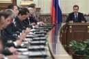 Russian PM Medvedev chairs a meeting of the new cabinet in Moscow's White House