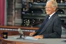 FILE - In this July 16, 2013 file photo, host David Letterman smiles on the set of the 