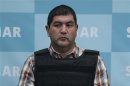 Ivan Velasquez Caballero, a suspected drug leader of the Zetas drug cartel, is presented to the media in Mexico City