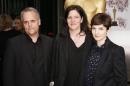 Filmmaker Laura Poitras, producer Dirk Wilutzky and producer Mathilde Bonnefoy from the Oscar-nominated documentary feature "Citizenfour" pose at a reception ahead of the upcoming 87th Academy Awards ceremony in Beverly Hills