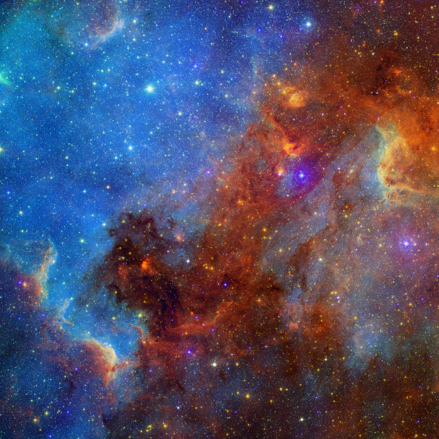A photo provided by NASA shows a Spitzer Space Telescope view of the North American nebula in the visiible light spectrum.  The shape of North America is a result of clouds of dust obscuring light.  (