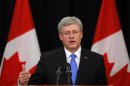 Canadian Prime Minister Harper answers questions on the train explosion in Quebec in Calgary