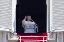 Pope Francis celebrates the Angelus noon prayer from his studio window overlooking St. Peter's square, at the Vatican, Sunday, July 6, 2014. (AP Photo/Alessandra Tarantino)