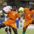 Ivory Coast's Bony and Drogba are challenged by Algeria's Halliche during their African Nations Cup (AFCON 2013) Group D soccer match in Rustenburg