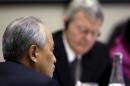 China's Ambassador to the U.S. Cui Tiankai listens as U.S. Ambassador to China Max Baucus takes notes as Chinese President Xi Jinping speaks at a U.S.-China business roundtablein Seattle, Washington