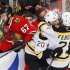 Bruins' Paille celebrates his overtime winning goal with teammate Ference as Blackhawks' Frolik skates away during overtime in Game 2 of their NHL Stanley Cup Finals hockey series in Chicago