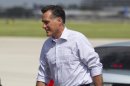 Republican presidential candidate, former Massachusetts Gov. Mitt Romney walks to his car after arriving at Tampa International Jet Center, Tuesday, Aug. 28, 2012, in Tampa, Fla. (AP Photo/Evan Vucci)