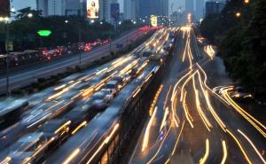 A timed-shutter exposure of evening gridlock traffic …
