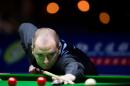Graeme Dott of Britain plays a shot during the Snooker Shanghai Masters in Shanghai on September 11, 2014