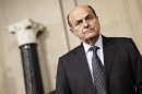 Italy's PD leader Bersani looks on during a news conference following a meeting with Italian President Napolitano at the Quirinale Presidential palace in Rome