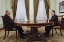 Russian President Vladimir Putin, left, and Russian Prime Minister Dmitry Medvedev meet in the Novo-Ogaryovo residence outside Moscow, Thursday, Sept. 27, 2012. A year ago, Dmitry Medvedev showed an unswerving loyalty to his mentor Vladimir Putin when he refused to seek a second presidential term and agreed to swap jobs. But Medvedev's self-denial hasn't prevented Putin from systematically rolling back indecisive and half-hearted attempts at liberal reforms made by his pliant placeholder during four years in the Kremlin. That campaign has seen the revision of Medvedev's laws, the reversal of some of his key policies and even rolling back his initiative to move the clock. (AP Photo/RIA-Novosti, Dmitry Astakhov, Government Press Service)