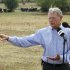 FILE - In this Aug. 23, 2012, file photo, Sen. James Inhofe, R-Okla., speaks  against the expansion of the Clean Water Act to authority over wet areas on private land in a pasture owned by Gary Johnson in Waukomis, Okla. While the looming fiscal cliff dominates political conversation in Washington, some Republicans and business groups see signs of a "regulatory cliff" they say could be just as damaging to the economy. President Barack Obama has spent the past year "punting" on a slew of job-killing regulations that will be unleashed in a second term, said Inhofe. (AP Photo/Sue Ogrocki, File)
