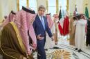 U.S. Secretary of State Kerry walks with Saudi Arabia's Foreign Minister Saud bin Faisal bin Abdulaziz Al Saud during meeting of Gulf foreign ministers in Riyadh