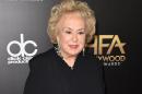 FILE - In this Nov. 1, 2015 file photo, Doris Roberts arrives at the Hollywood Film Awards in Beverly Hills, Calif. Family spokeswoman said Monday, April 18, 2016, that Roberts died overnight Sunday in her sleep in Los Angeles. She was 90. (Photo by Jordan Strauss/Invision/AP, File)