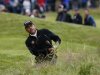 Jeev Milkha Singh watches his shot from the rough during the second round of the British Open golf championship at Royal Lytham & St Annes