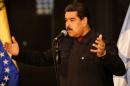 Venezuela's President Nicolas Maduro talks to the media during a news conference at Miraflores Palace in Caracas