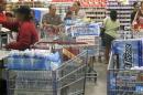 Shoppers prepare for a hurricane and tropical storm heading toward Hawaii