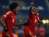 Munich's David Alaba celebrates after he scored against Schalke 04 during their German Bundesliga first division soccer match in Munich